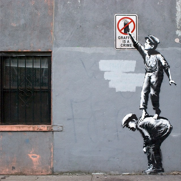 BanksyNYC-Banksy-Graffiti-is-a-Crime-Chinatown-NYC
