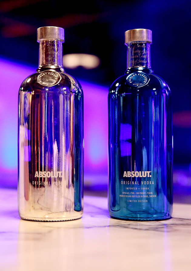 LOS ANGELES, CA - OCTOBER 23:  Absolut Electrik bottles on display at Absolut Electrik House, an epic house party transformed by the energy of its guests in celebration of new limited edition Absolut Electrik bottle, on October 23, 2015 in Los Angeles, California.  (Photo by Todd Williamson/Getty Images for Absolut)