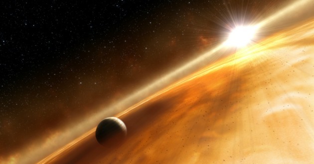 This illustration shows the newly discovered planet, Fomalhaut b, orbiting its sun, Fomalhaut. A structure comprised mostly of brown and gold colors surrounds Fomalhaut b. This structure is a Saturn-like ring that astronomers say may encircle the planet. Fomalhaut also is surrounded by a ring of material.