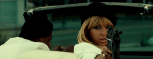 Jay Z y Beyoncé en medio de una película de acción